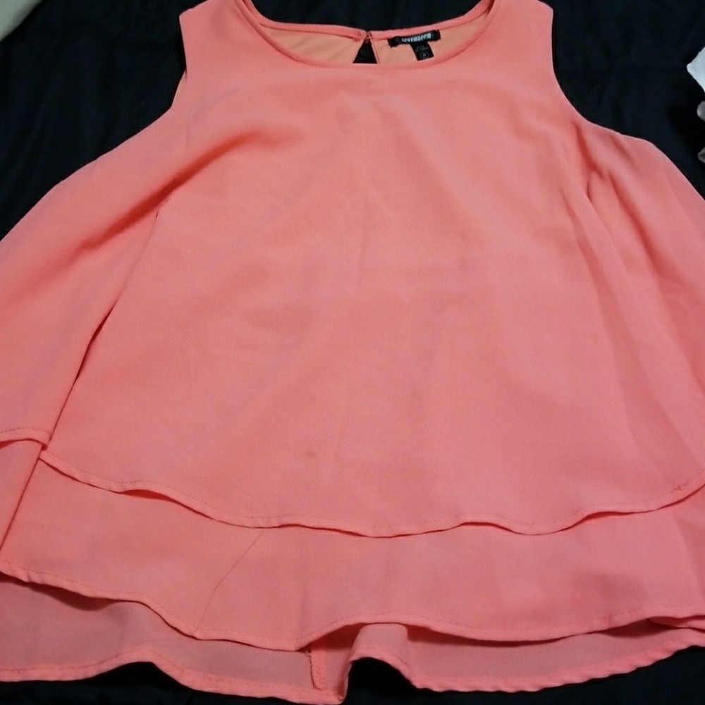 Peach sleeveless blouse